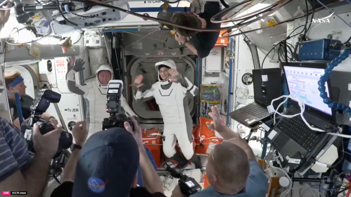 Butch Wilmore and Suni Williams, two veteran NASA astronauts who have been stuck on the International Space Station for nine months, wave at the hatch of a SpaceX Crew Dragon capsule before closing the hatch in preparation for undocking from the ISS to begin their return to Earth March 17, 2025 in this still image taken from video. Photo: Reuters