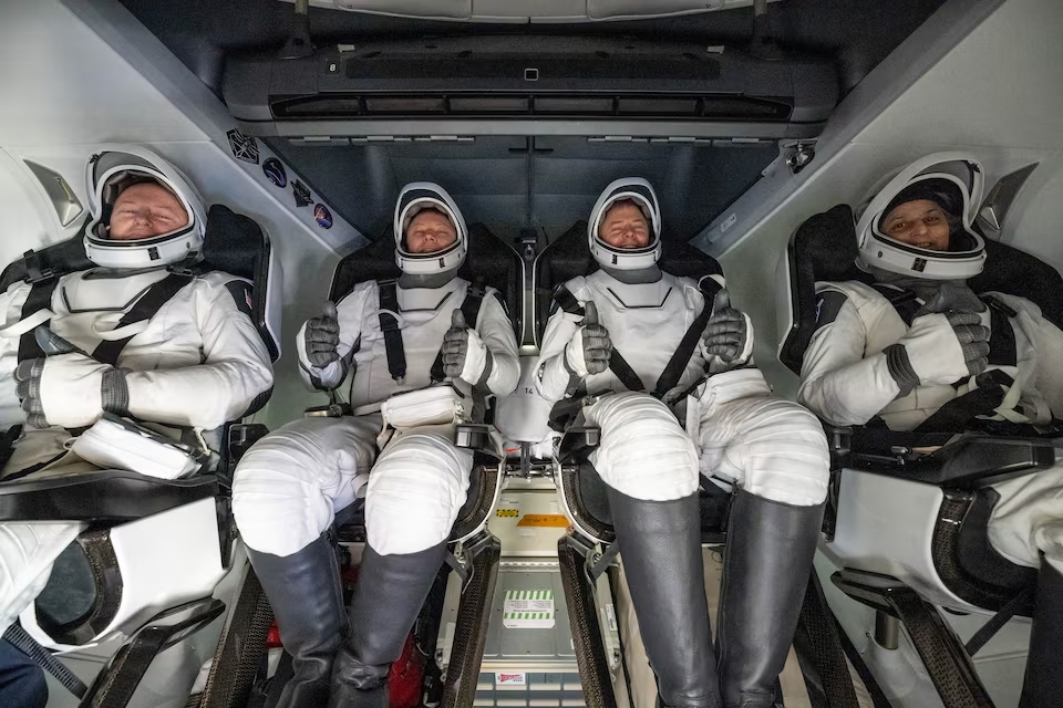 [3/16]NASA astronaut Butch Wilmore, Nick Hague, and Suni Williams and Roscosmos cosmonaut Aleksandr Gorbunov are seen inside a SpaceX Dragon spacecraft onboard the SpaceX recovery ship MEGAN shortly after having landed in the water off the coast of Tallahassee, Florida, Tuesday, March 18, 2025. Photo: Reuters