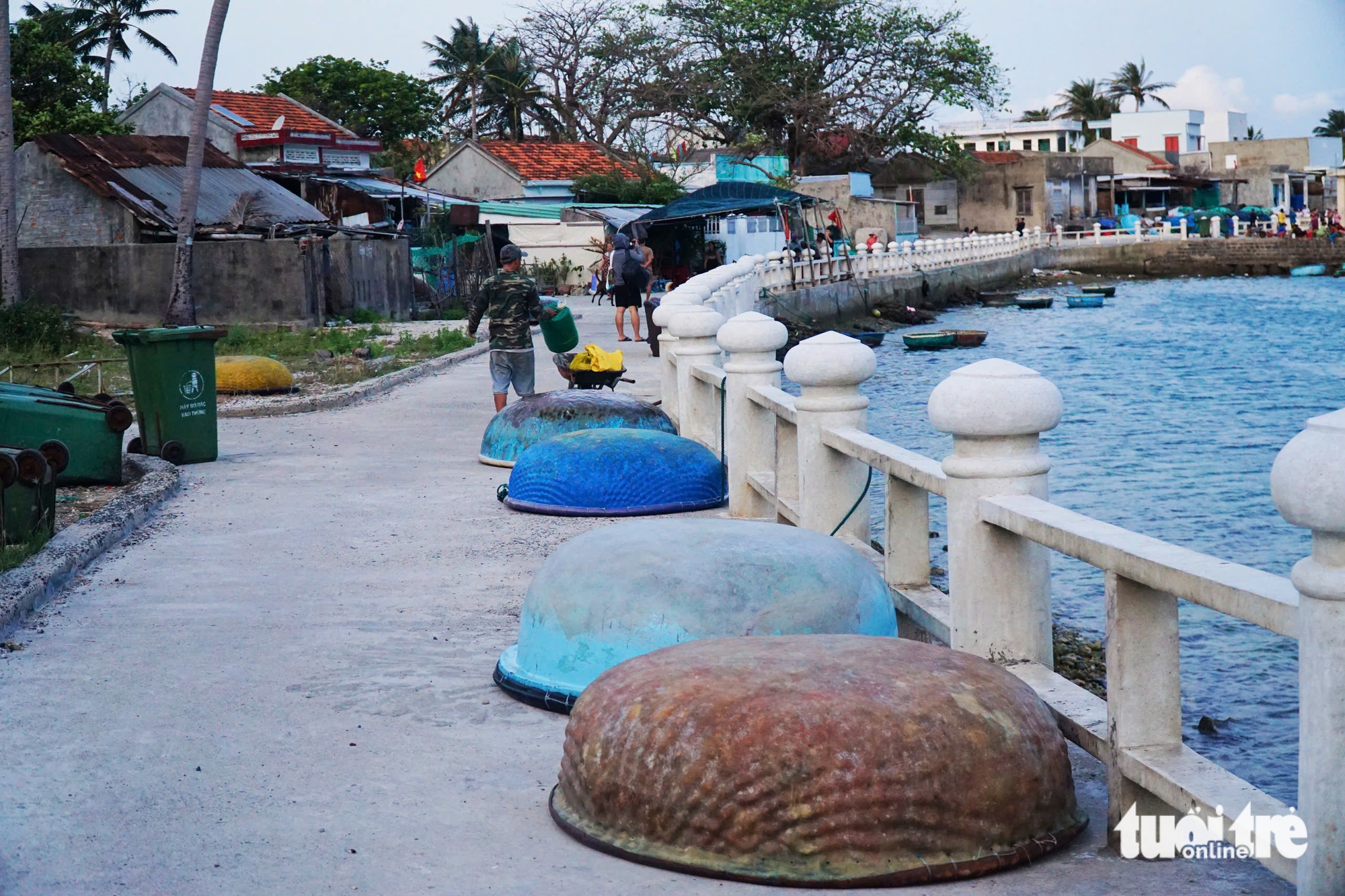 Basket boats lie along a coastal road on Bich Dam Island, Nha Trang Bay, Khanh Hoa Province, south-central Vietnam. Photo: Tran Hoai / Tuoi Tre