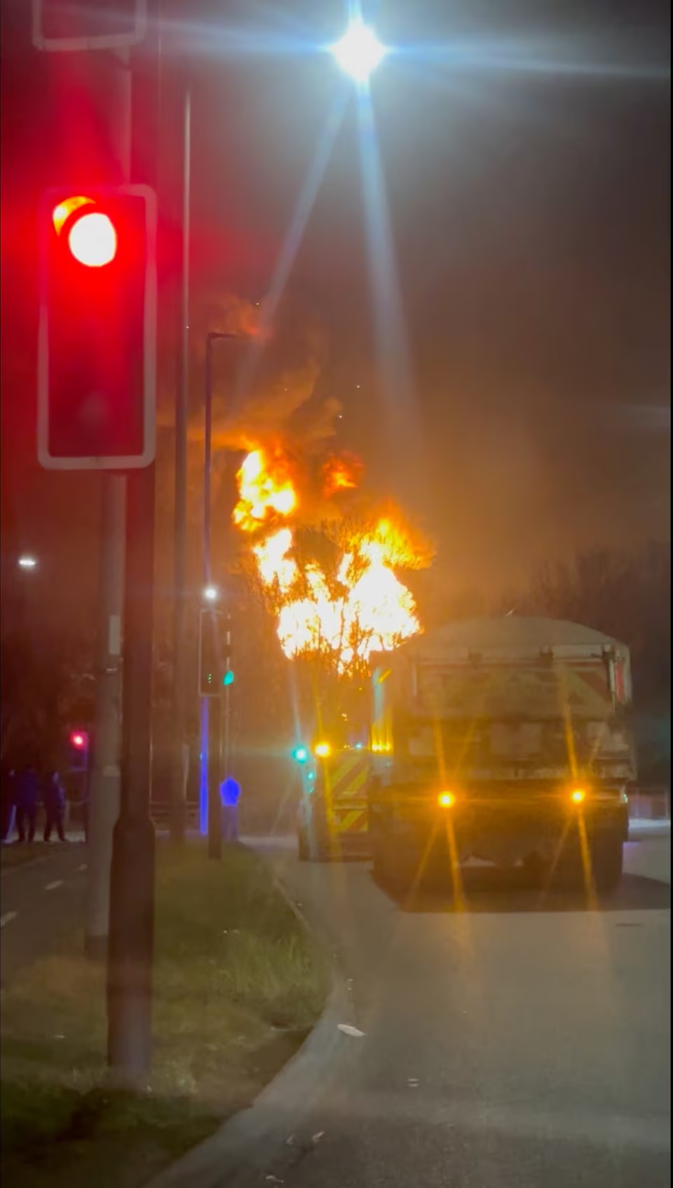 Plumes of smoke and fire rise from an electrical substation in Hayes, Britain March 20, 2025, in this screengrab obtained from a video. Video Obtained by Reuters